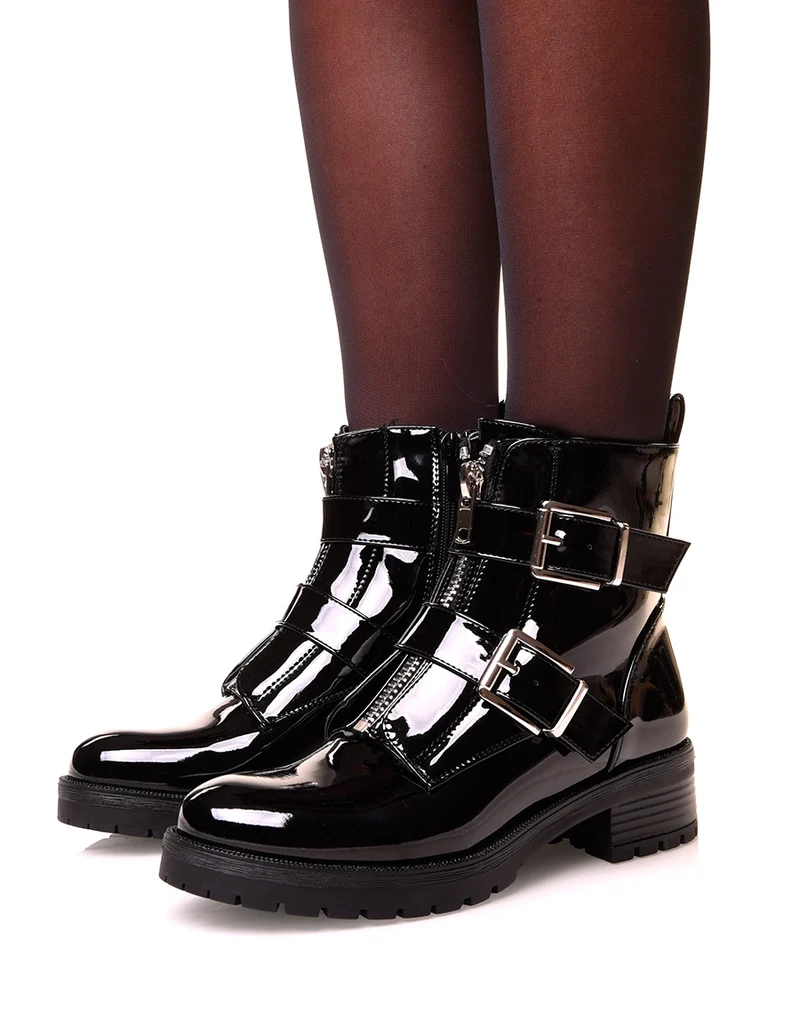 Boots noirs effet vernis à sangles