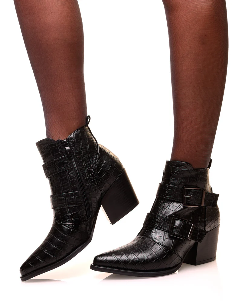 Bottines noires à talons et à effet croco