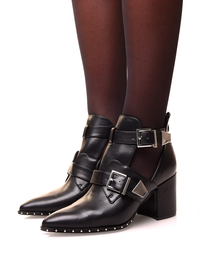 Bottines noires à talons ajourées de sangles