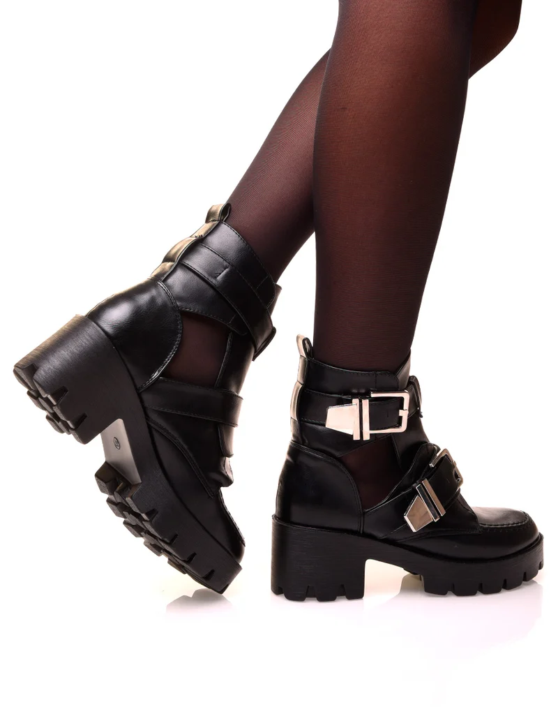 Bottines noires montantes ouvertes ajourées de boucles