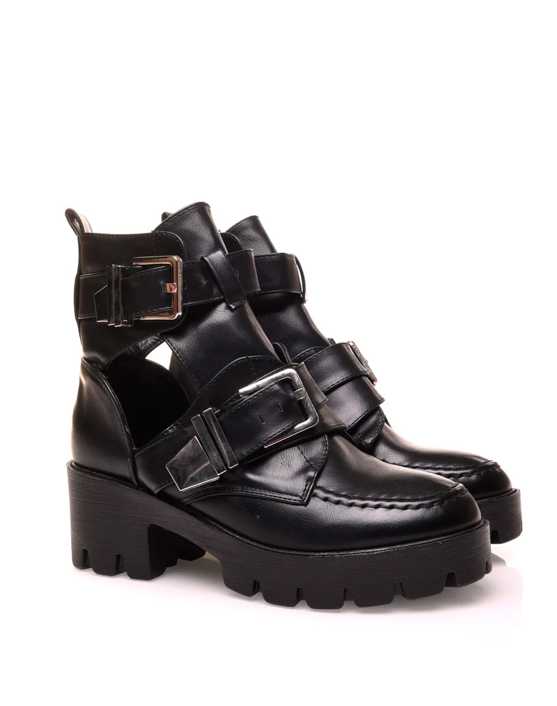 Bottines noires montantes ouvertes ajourées de boucles