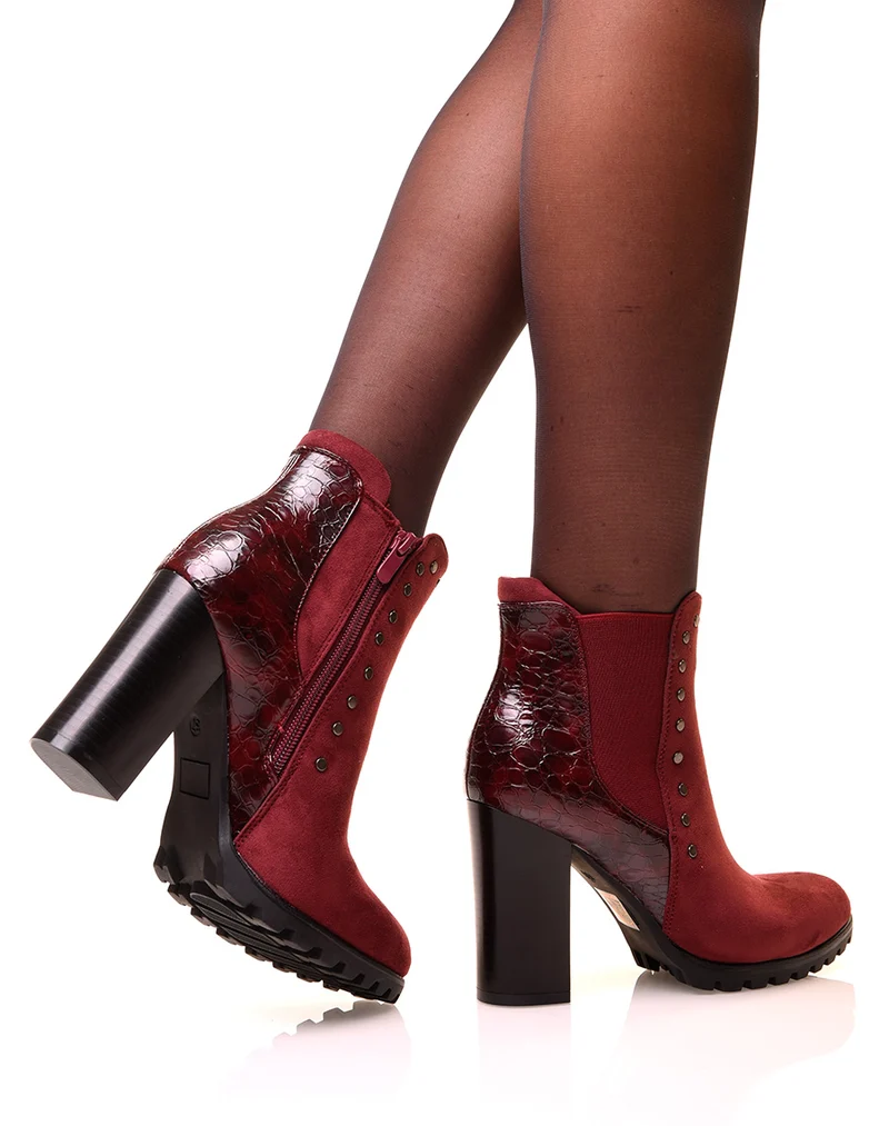Bottines bordeaux à talons bi-matières et à détails cloutés
