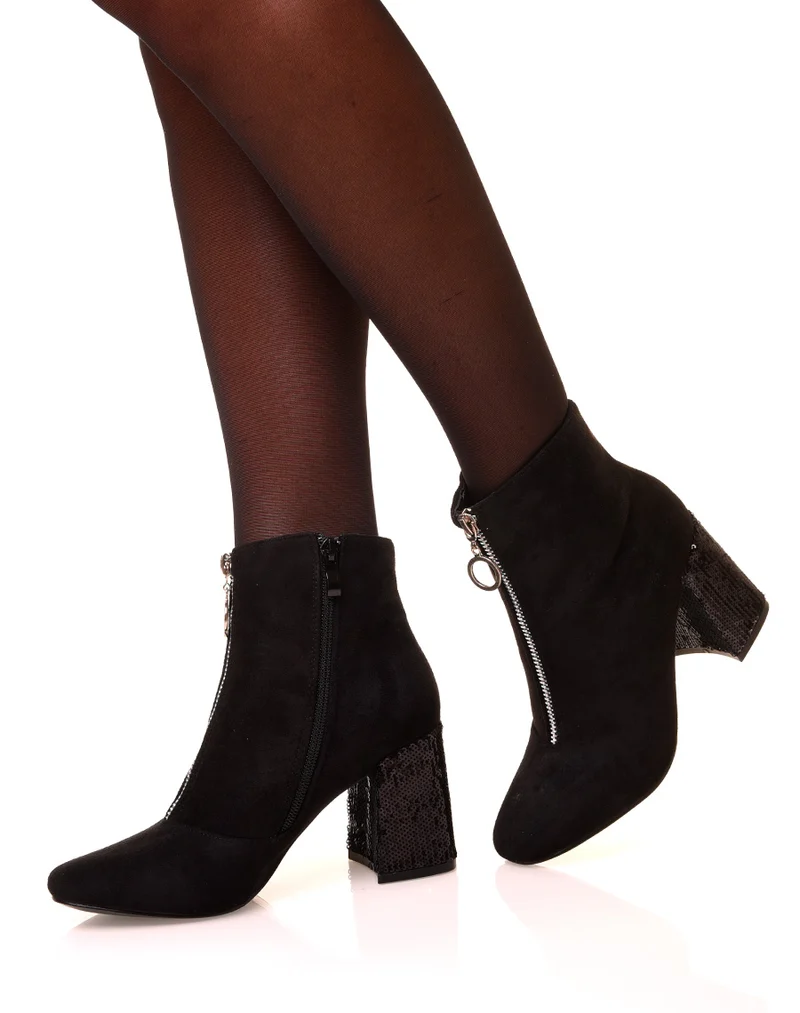 Bottines noires en suédine à talons pailletés