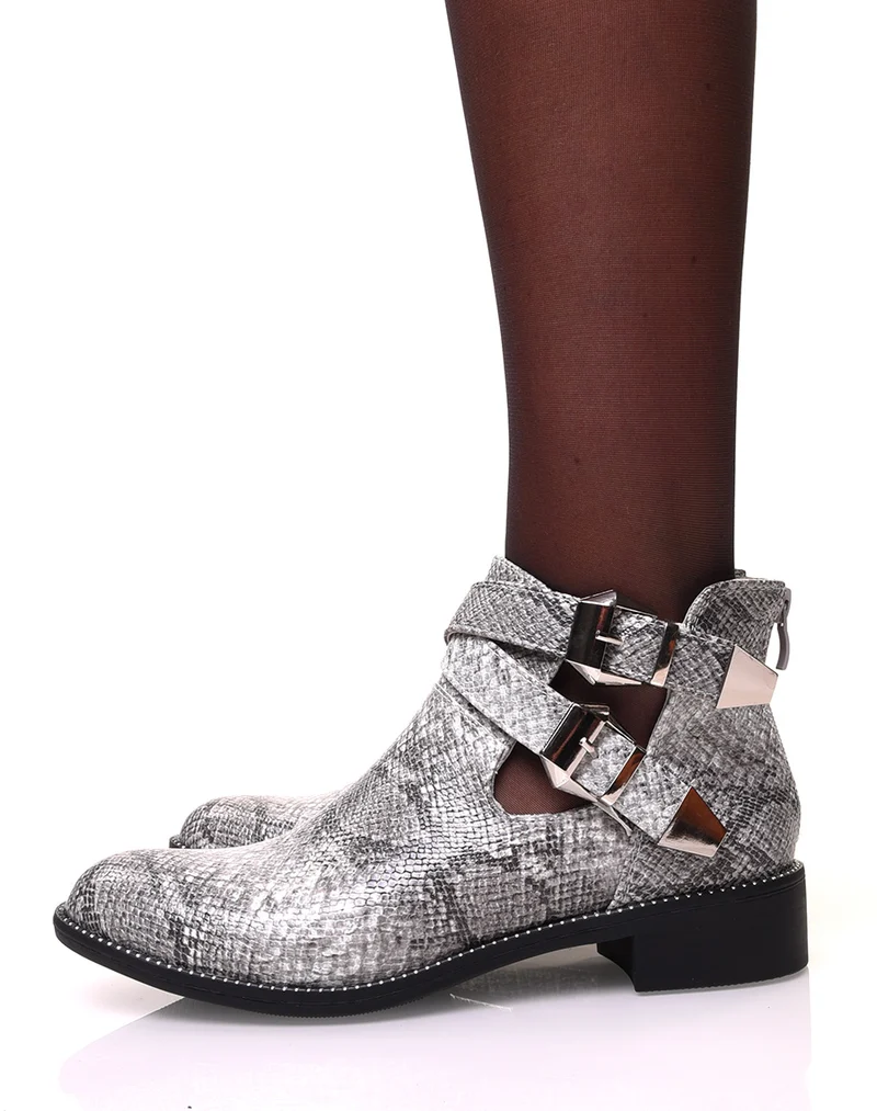 Bottines ajourées effet python perlées de clous sur la semelle