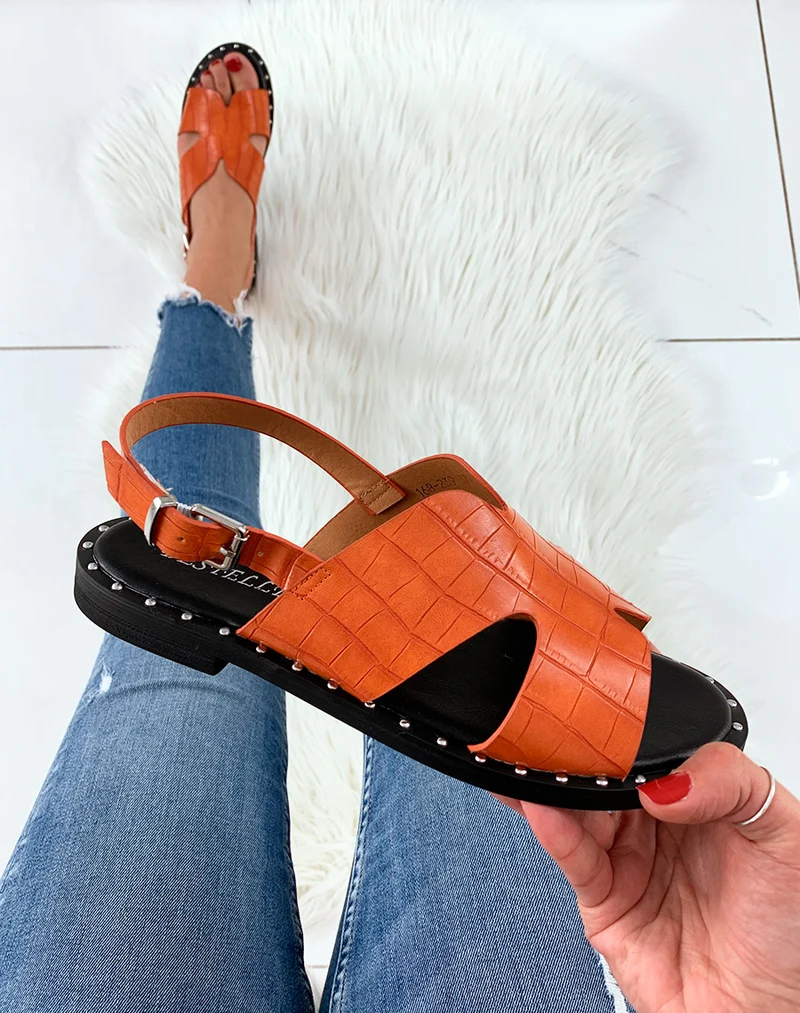 Nu-pied orange imprimé serpent à semelle cloutée