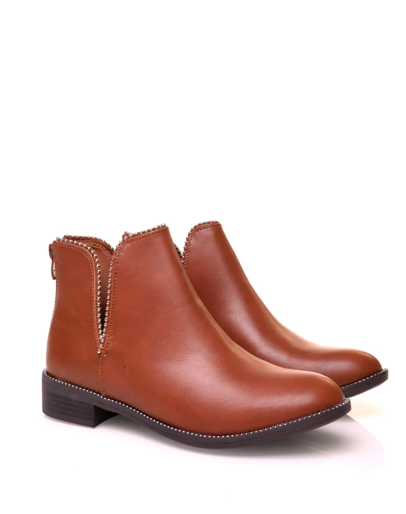 Bottines effet python ajouré à clous ronds