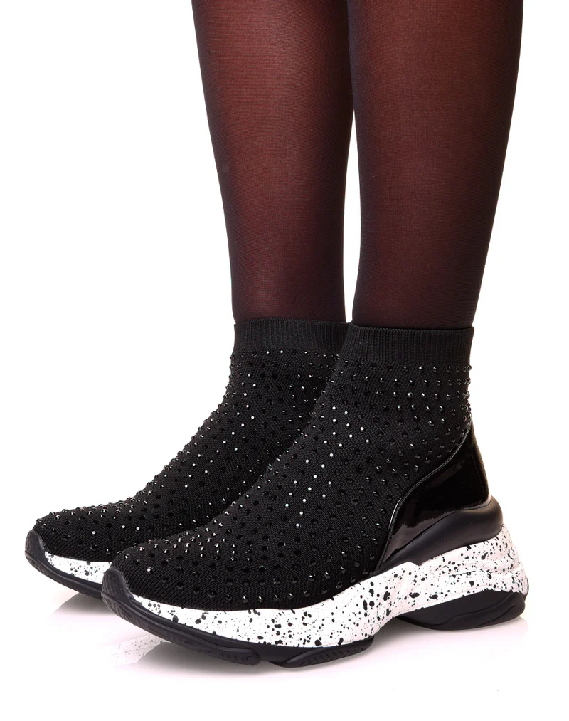 Baskets noires en forme de chaussette à semelles tachetées