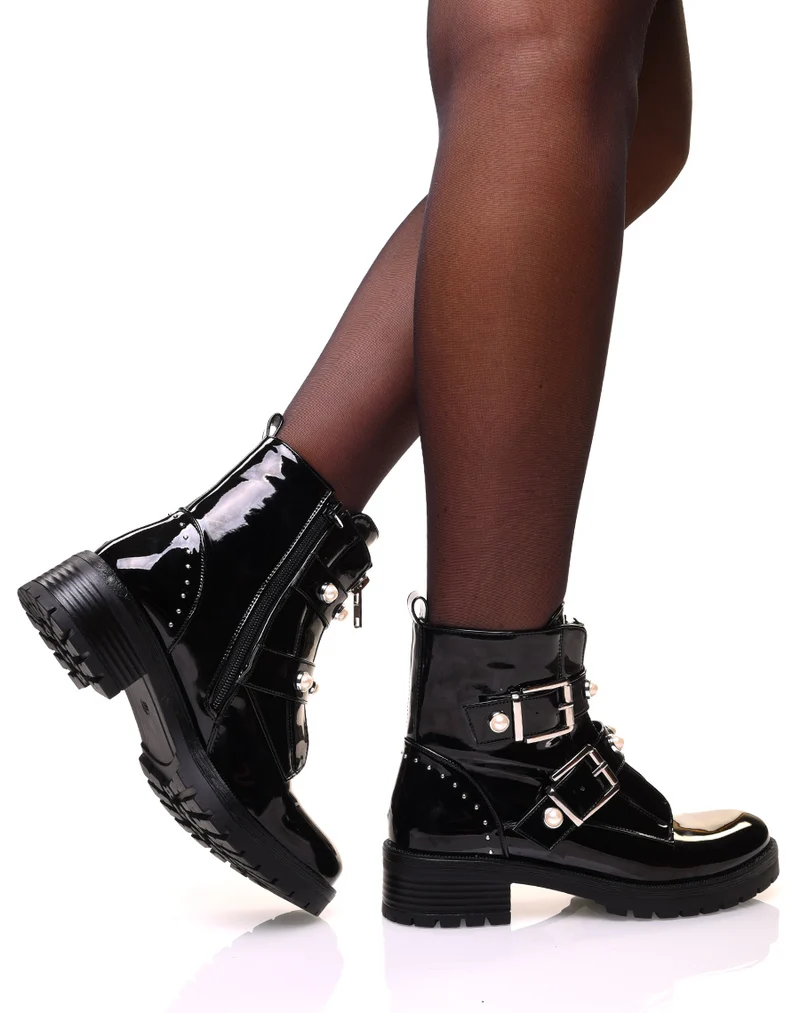 Bottines montantes vernies noires à fermeture éclaire et sangles perlées
