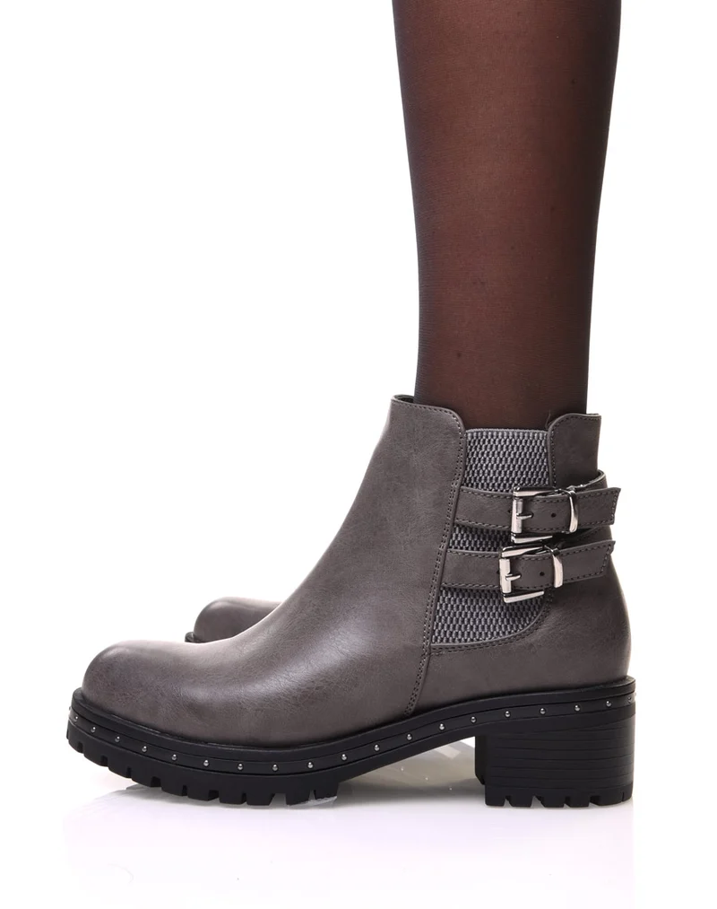 Bottines grises à semelle crantée et cloutée