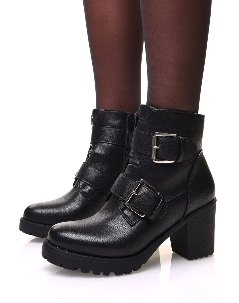 Bottines noires à talons et sangles