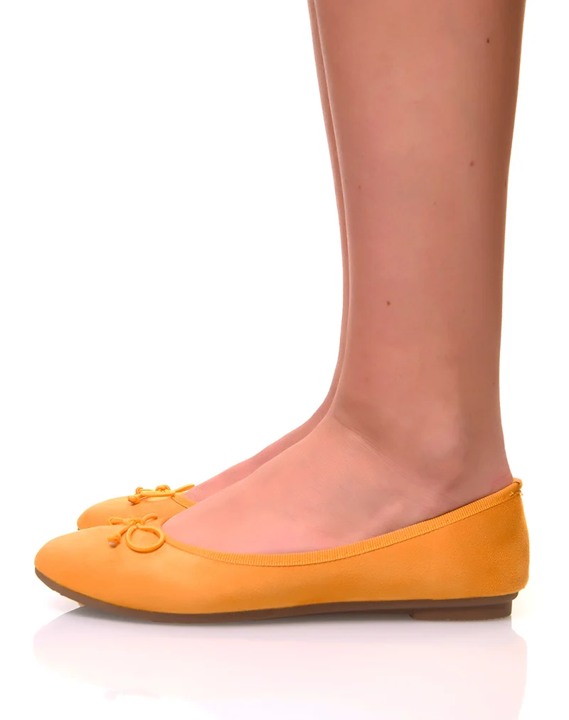 Ballerines jaunes en suédine à petits noeuds