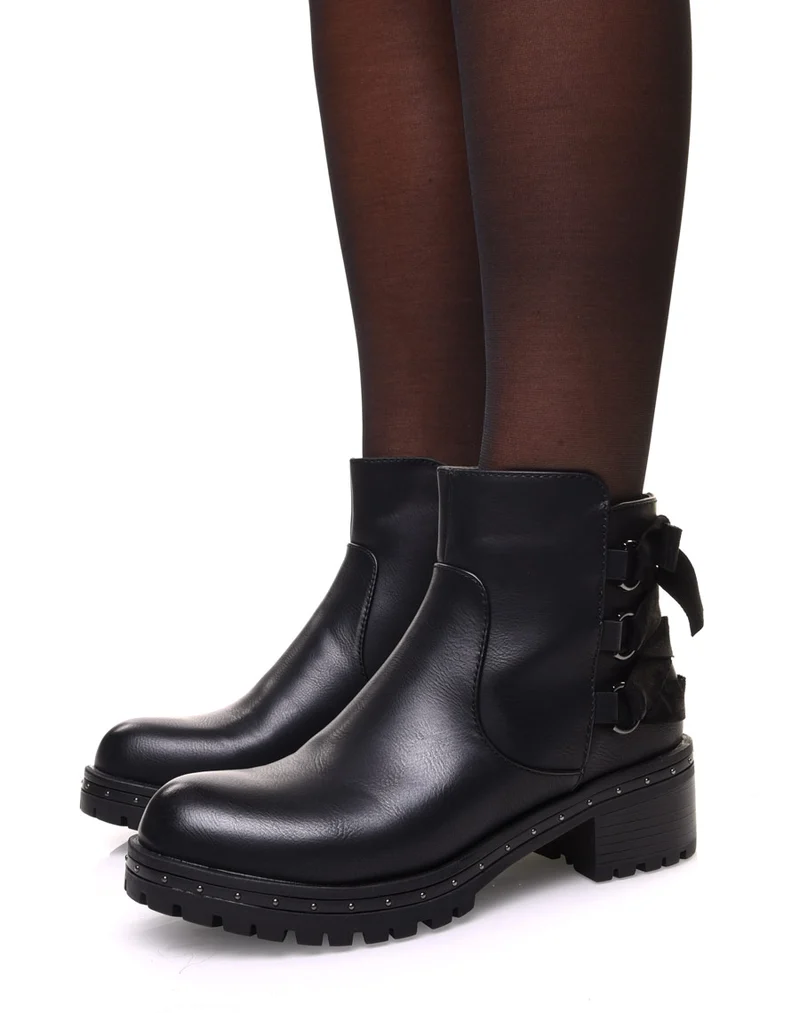Bottines noires à nœud et semelle crantée