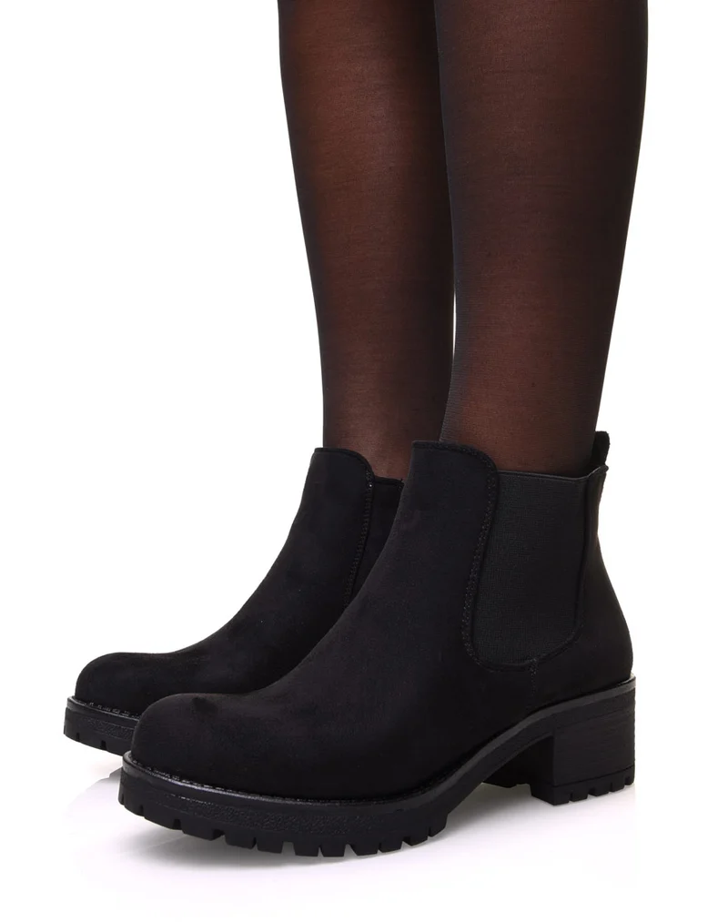 Chelsea boots noires en suédine à talon mi haut
