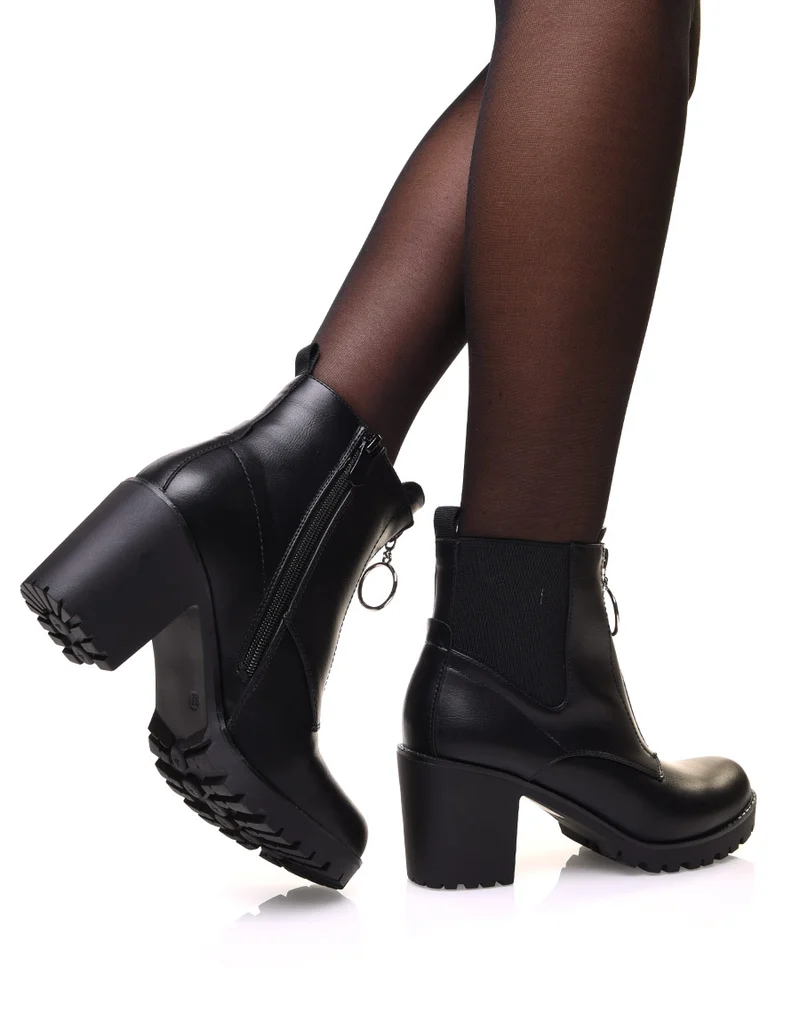 Bottines noires à talon mi haut et semelle crantée