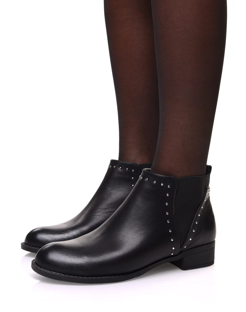 Bottines noires à élastiques ajourées