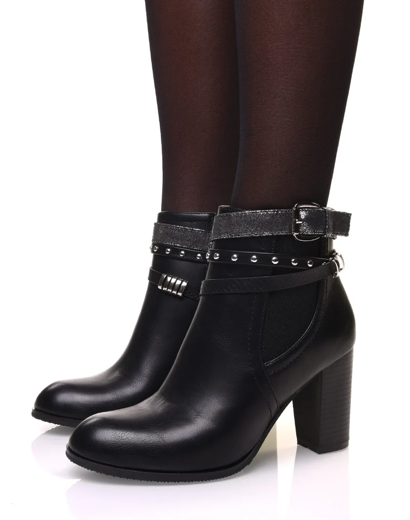 Bottines noires à talon avec de multiples sangles