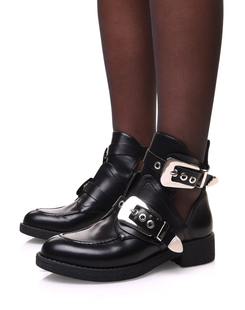 Bottines noires plates ajourées avec sangles