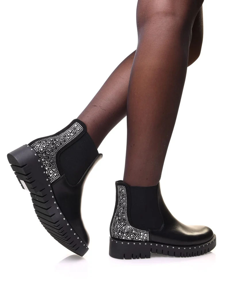 Chelsea boots noires avec détails strass à l’arrière