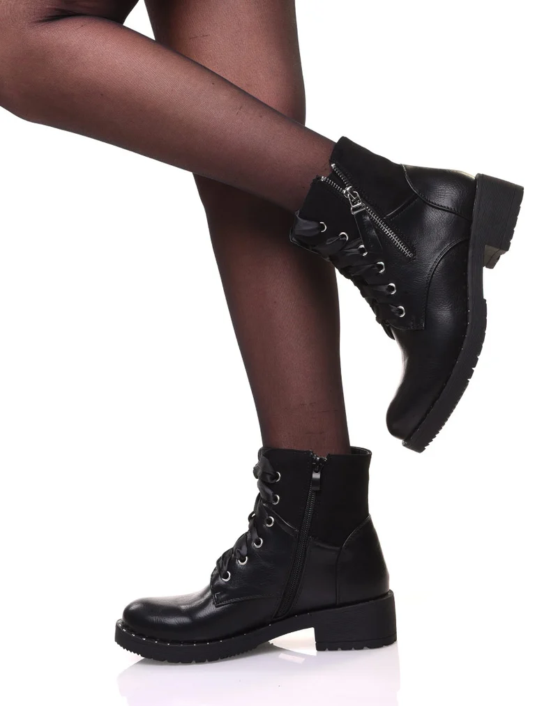 Bottines noires à lacets et semelles cloutées