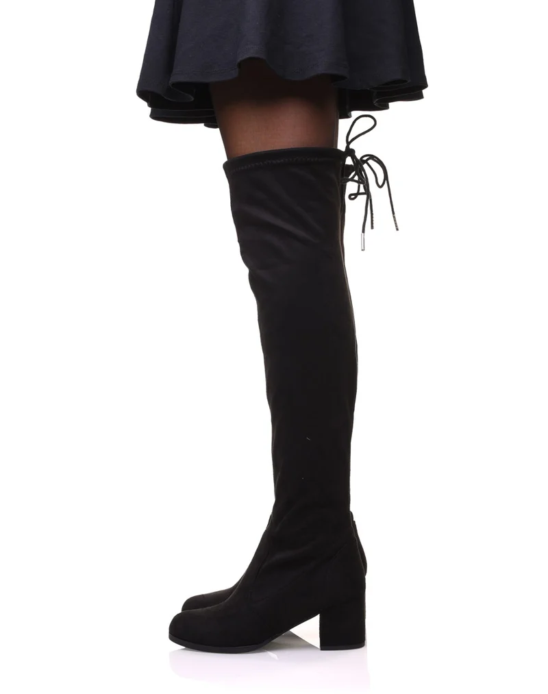 Cuissardes noires en suédine à talons mi hauts
