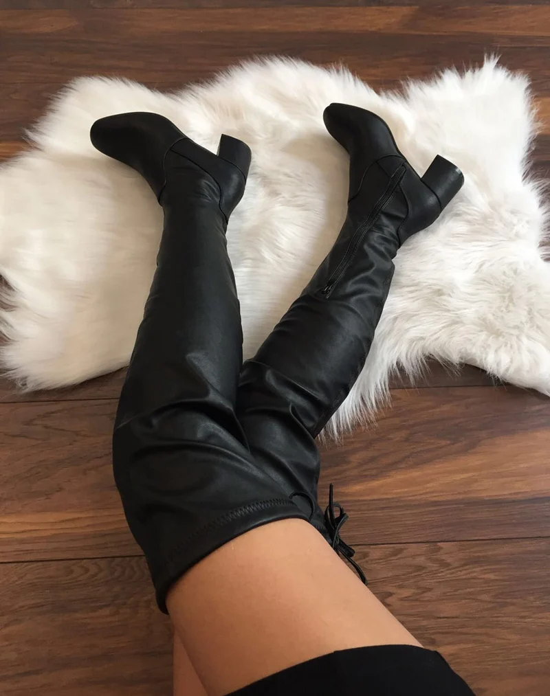 Cuissardes souples noires à talons mi hauts