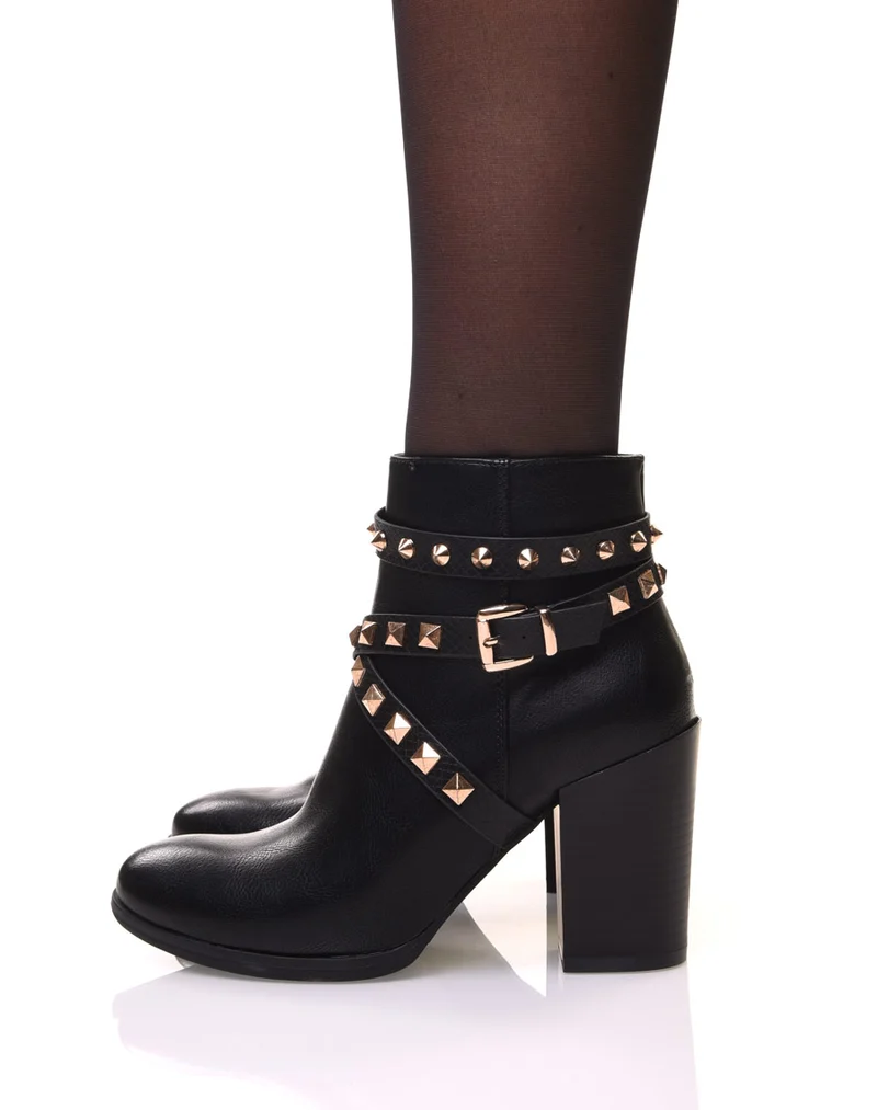 Bottines noires à talons et clous pyramidaux
