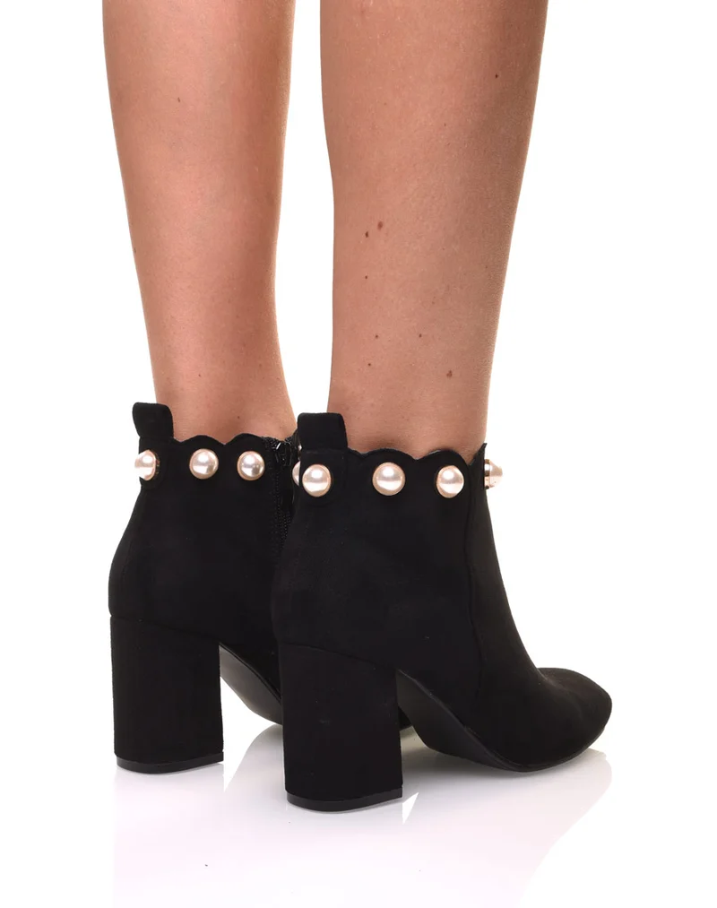 Bottines noires bordées de perles
