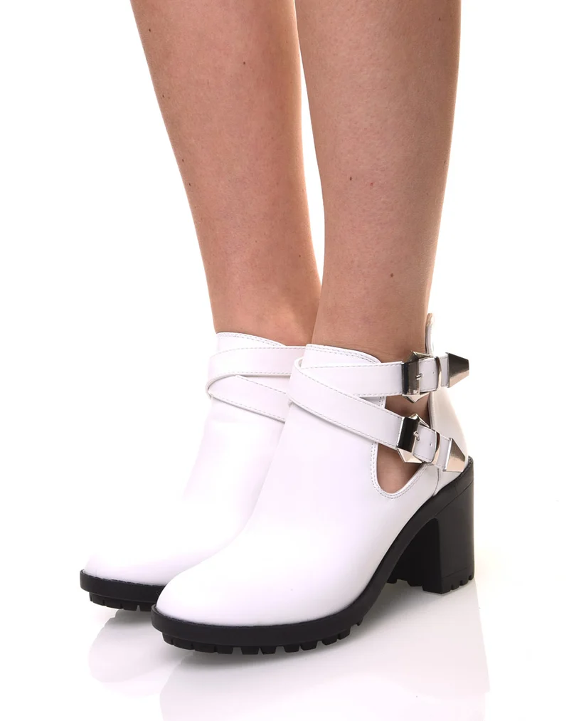 Bottines blanches crantées à boucles croisées