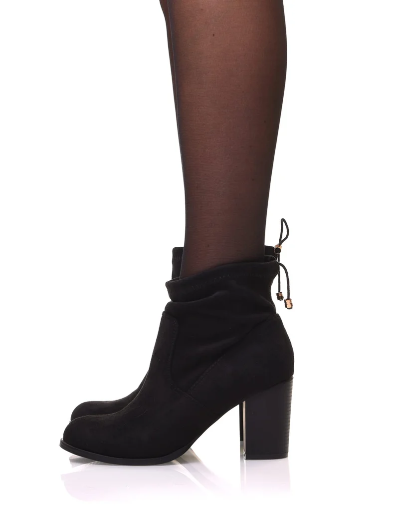 Bottines noires souples en suédine à talons