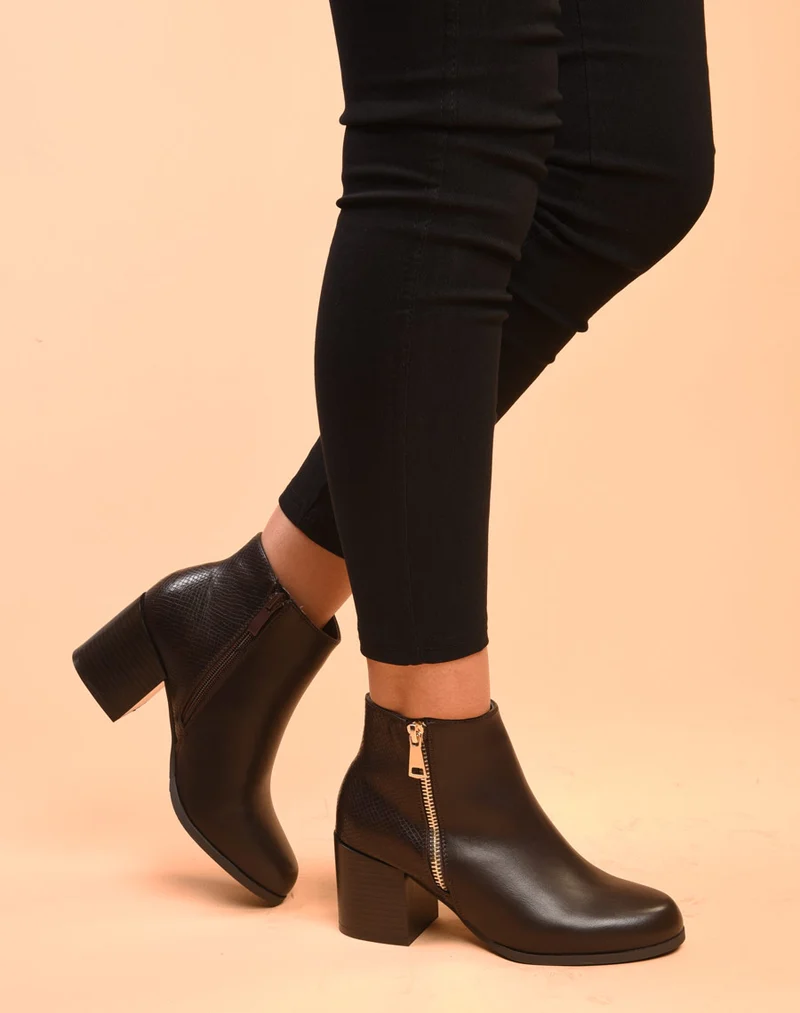 Bottines à talons noires avec fermeture & motifs python