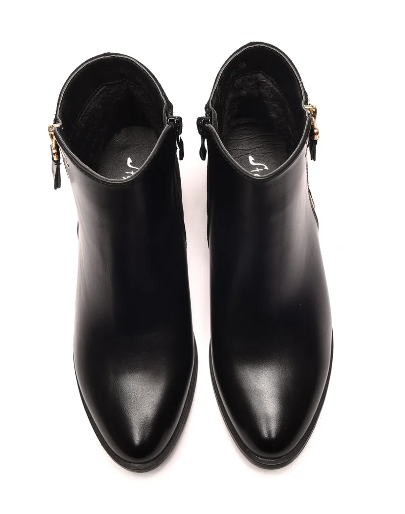 Bottines noires plates bi matières avec détails à l'arrière