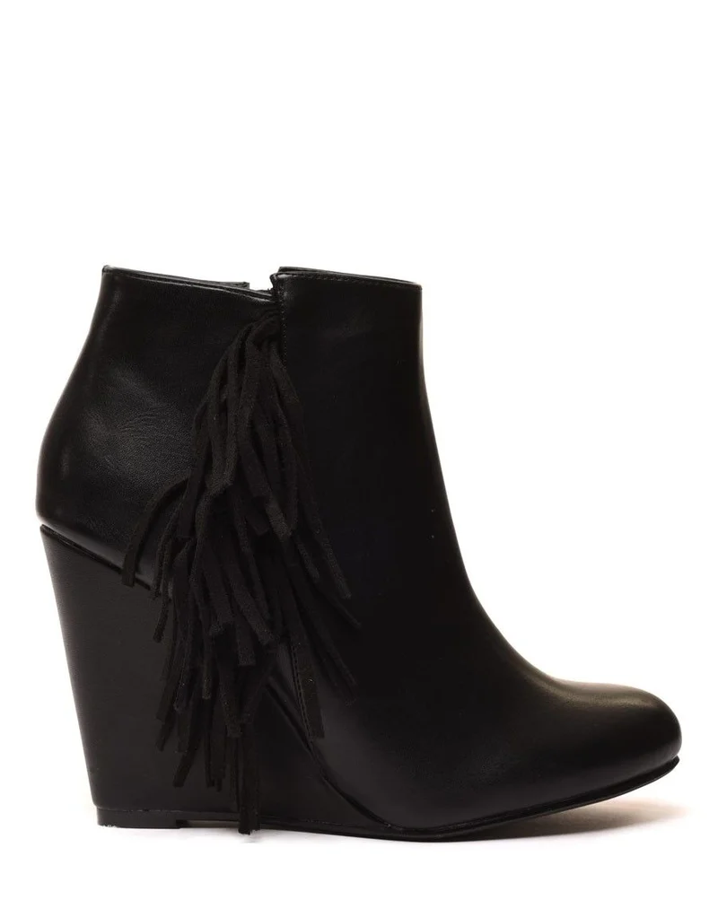 Bottines compensées noires à franges en suédine