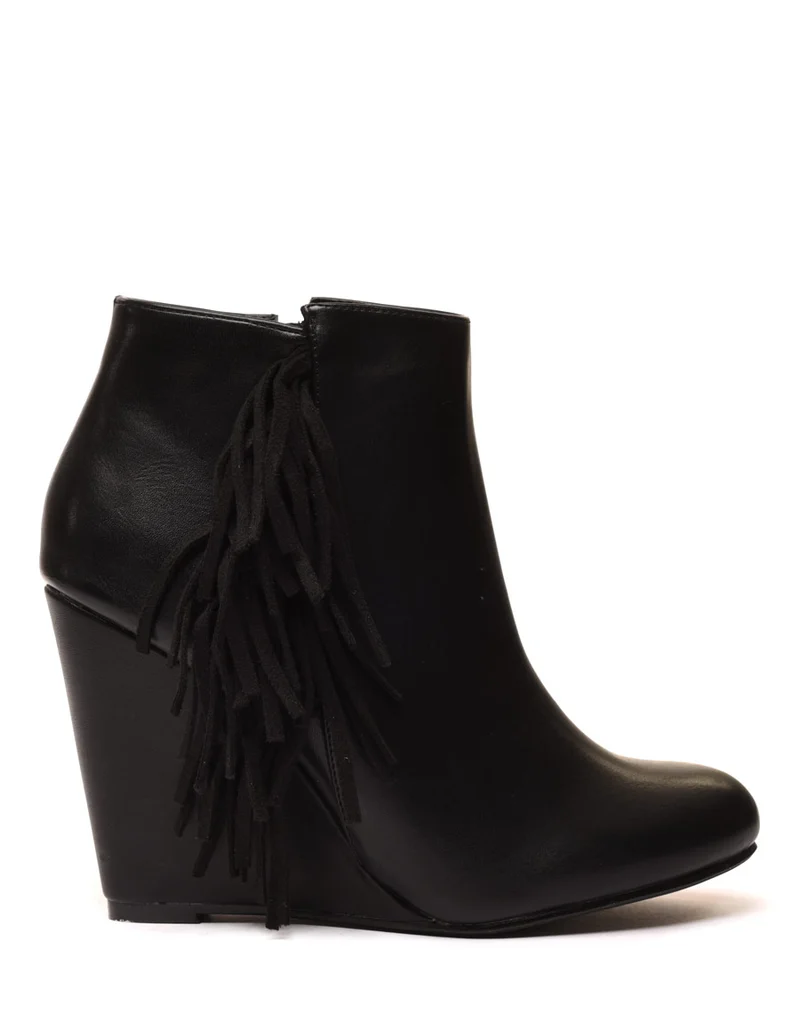 Bottines compensées noires à franges en suédine