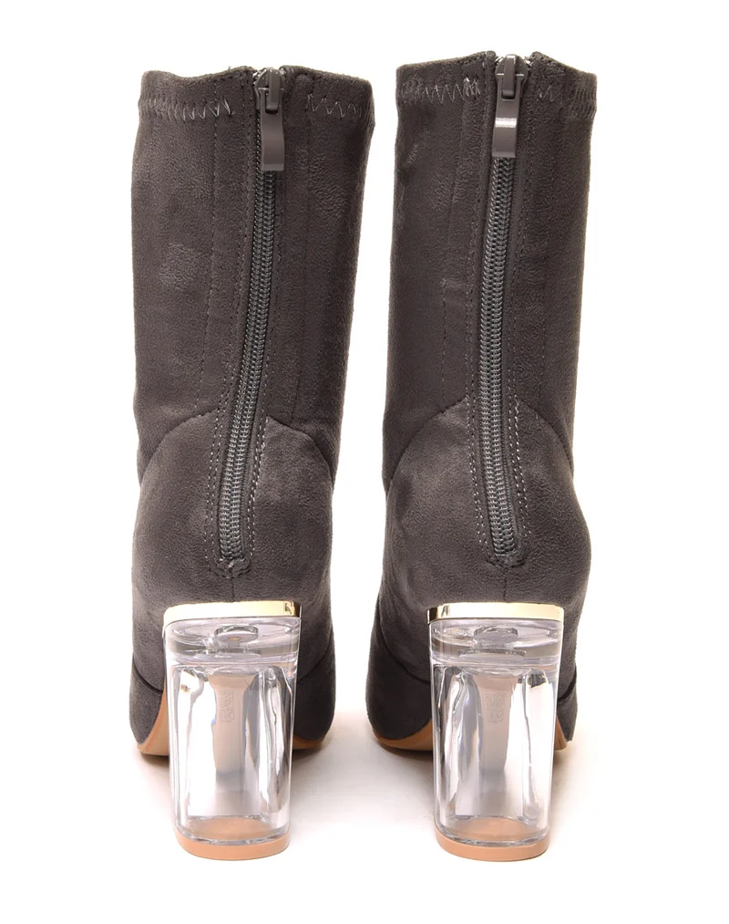 Bottines grises à talon transparent et haut souple