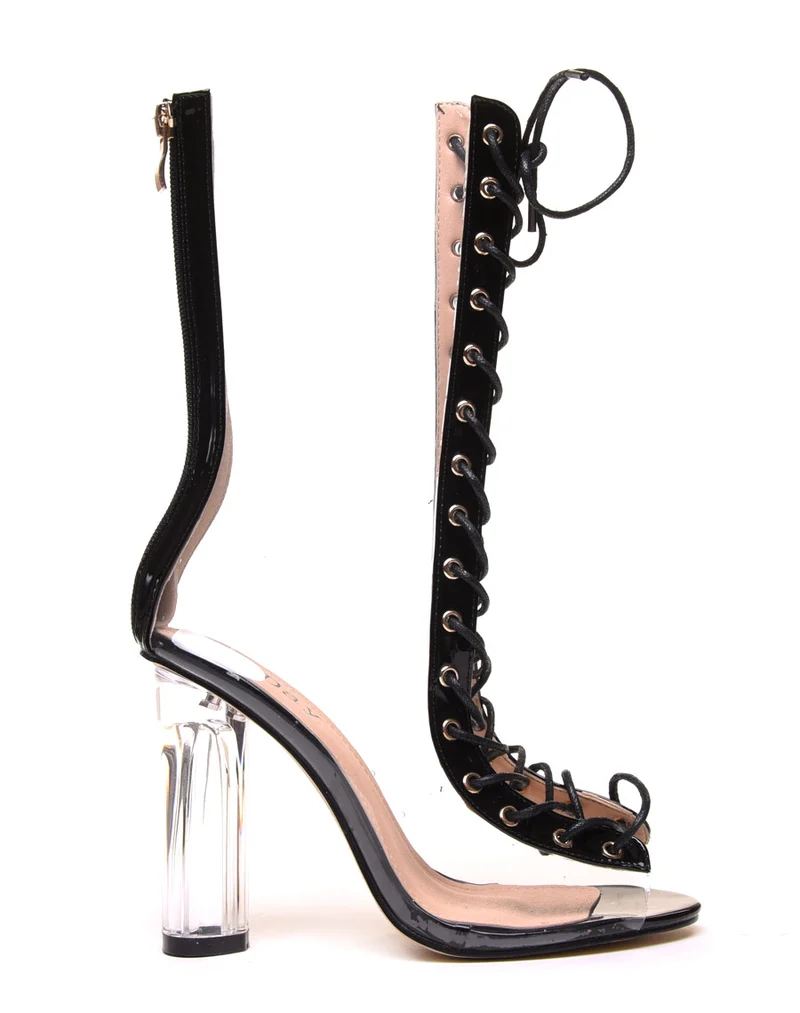 Bottes hautes noires à talons transparents
