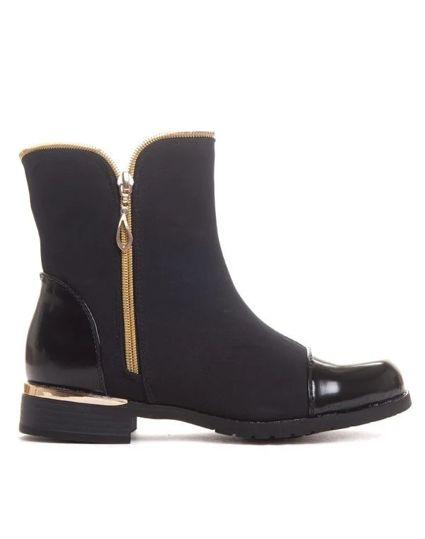 Bottines noires décoré par une fermeture éclaire dorée