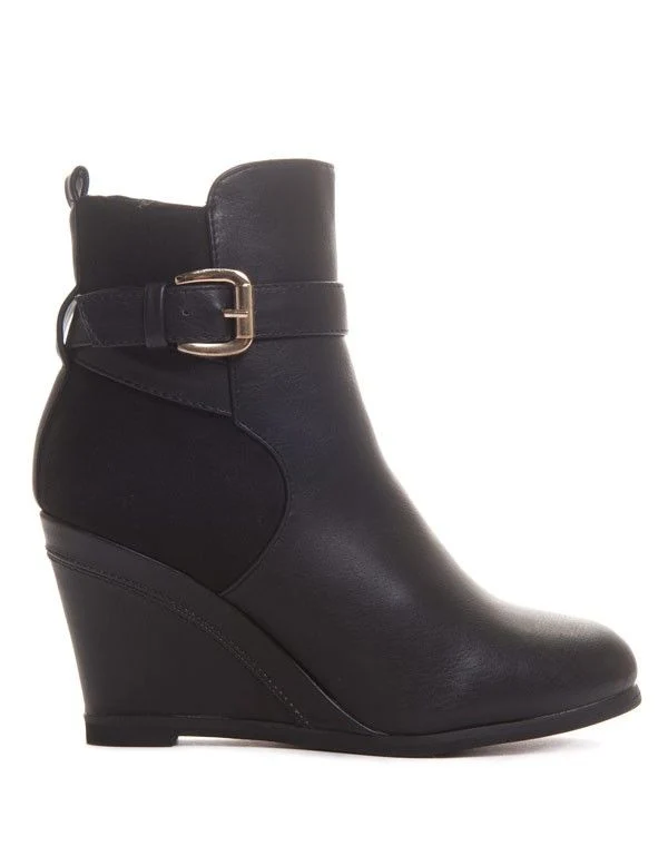 Bottines compensées noires bi matière à l'intérieur fourré
